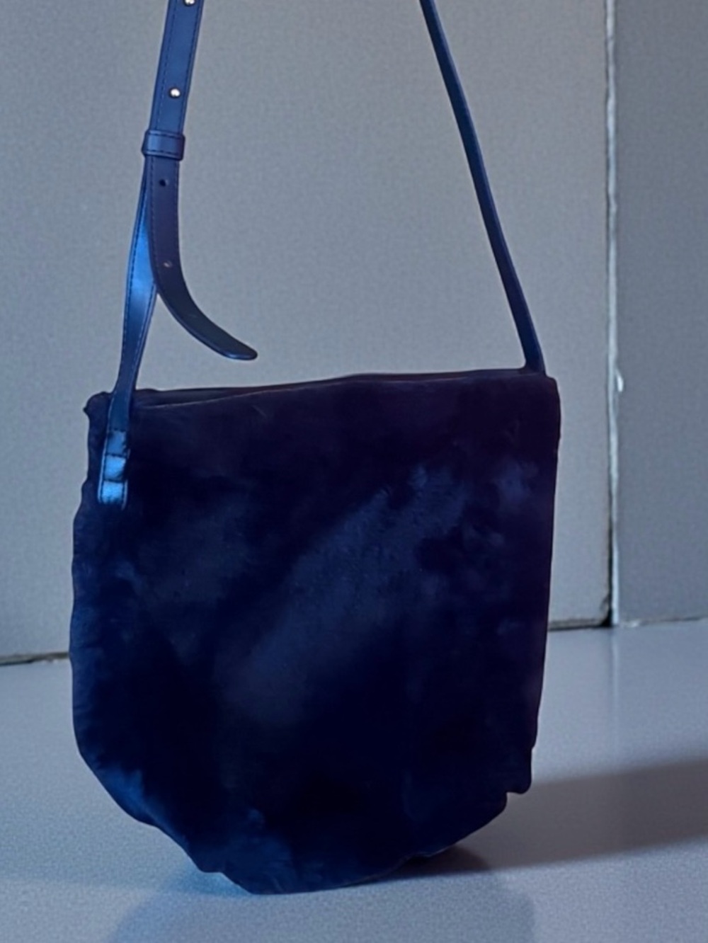 Mansur Gavriel luxury navy faux fur crossbody bucket bag adjustable strap